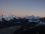 Gokyo Ri 08-2 Cholatse, Tawache, Kangtega, Thamserku, Kusum Kanguru From Gokyo Ri After Sunset A warm glow surrounds Cholatse, Taweche, Kangtega, Thamserku, and Kusum Kanguru after sunset from Gokyo Ri.